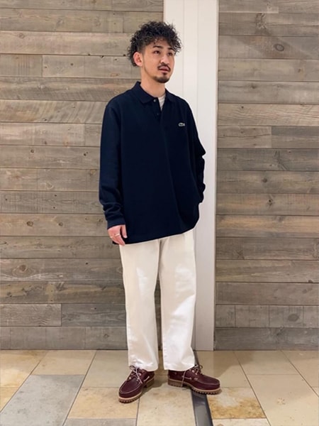 〈LACOSTE ラコステ〉のポロシャツ